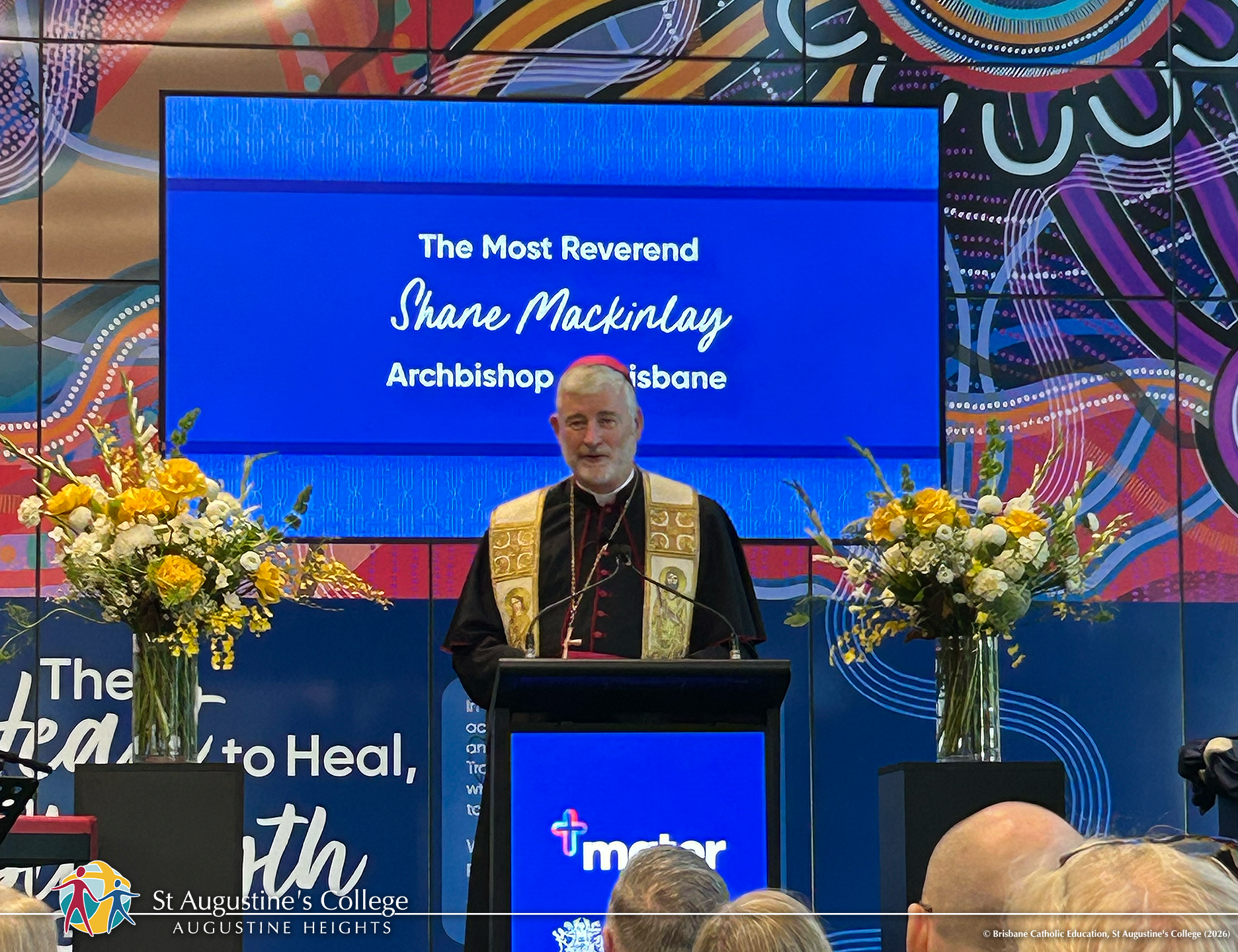 Archbishop Shane Mackinlay speaking at event opening.